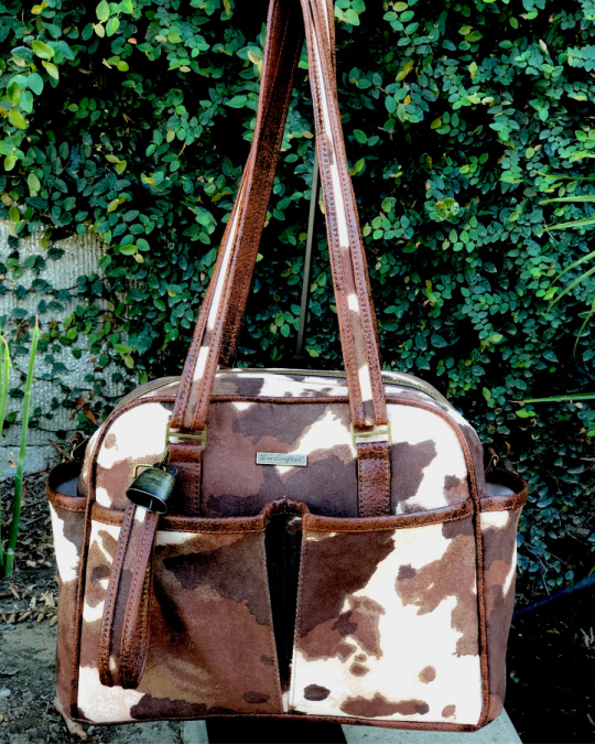 Belle Baby Bag, made by Tina Fong in cow print faux leather and faux suede