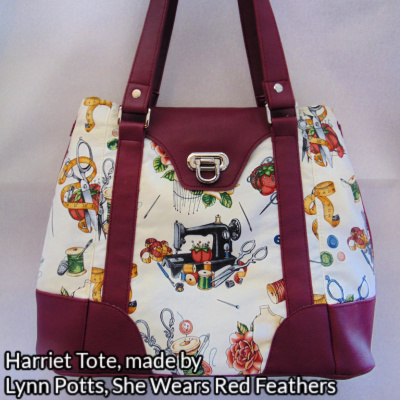 Harriet Expandable Tote Bag made by Lynn Potts from She Wears Red Feathers in fabric patterned with sewing machines, with a flip lock through the burgundy faux leather flap