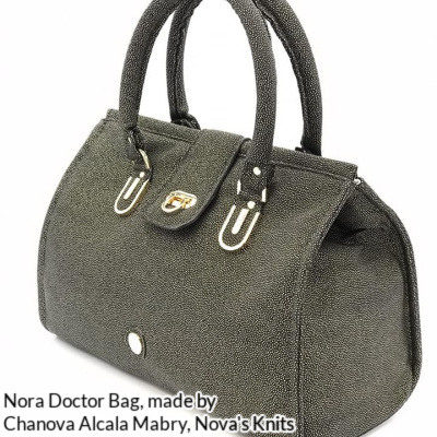 Nora Doctor Bag made by Chanova Alcala Mabry from Nova's Knits in grey fabrics, with decorative strap anchors