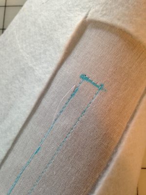Close-up of the vertical zippered pocket from the vintage Dallas Duffel Bag from Swoon Patterns